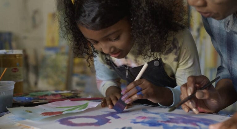 Children's Healthcare of Atlanta captures child painting during art class in Atlanta