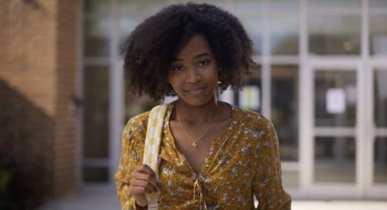 Children's Healthcare of Atlanta showing a student smiling outside Atlanta school