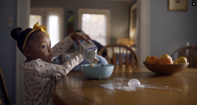Children's Healthcare of Atlanta highlights toddler spilling milk in kitchen