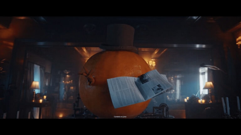 Orange character reading in Fanta ad by Moonshine
