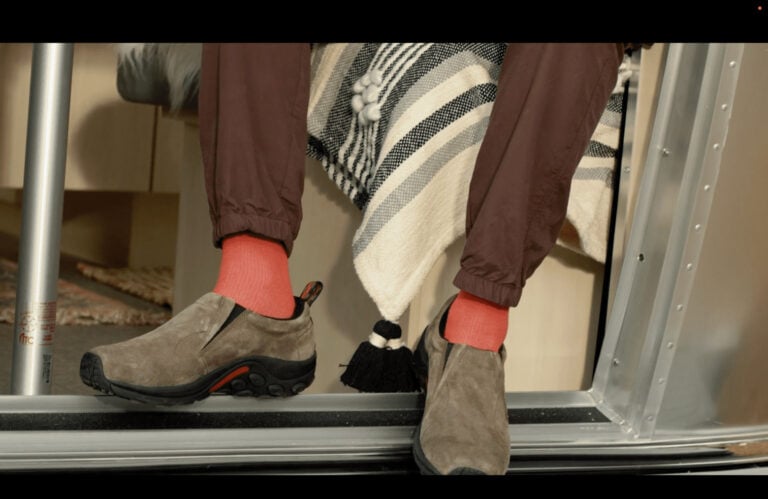 Casual Merrell footwear in an RV setting, post editing by Moonshine Post